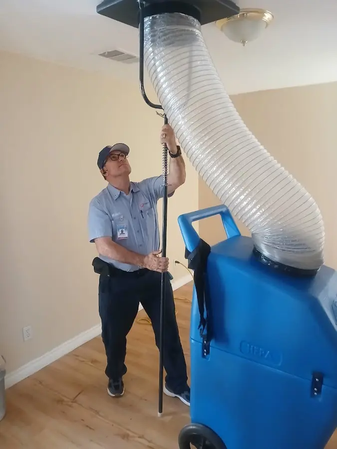 HVAC Installation technician using HEPA equipment in Bartlett